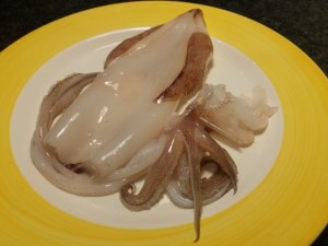 calamaro imbottito con friarielli provola e noci su polenta alla curcuma